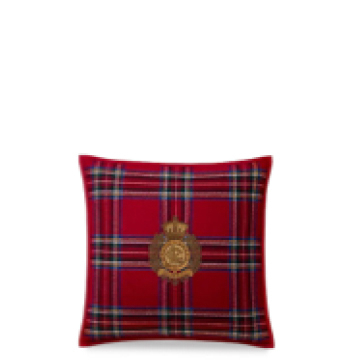Red plaid pillow with crest.