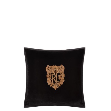 Red plaid pillow with crest.
