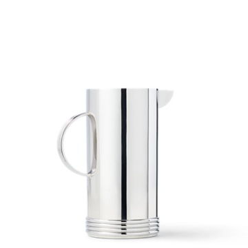 Two white beverage servers.